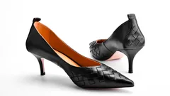 Scarpe nere da donna con tacco medio e design intrecciato elegante